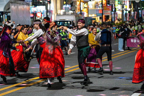 Dancers and participants from various countries taking part in the 2026 Cheonan Heungtaryeong Street Parade.
